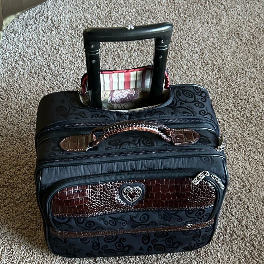 COPY - Brighton 15 by 12 by 9 inches depth rolling suitcase
 Clear zipper enclo…